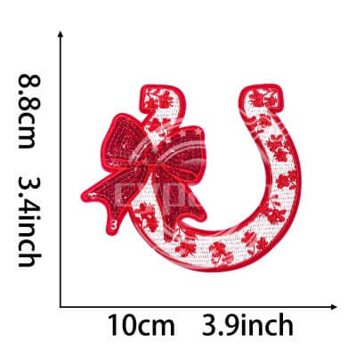 Red embroidered horseshoe patch with glitter bow and shamrock flower design