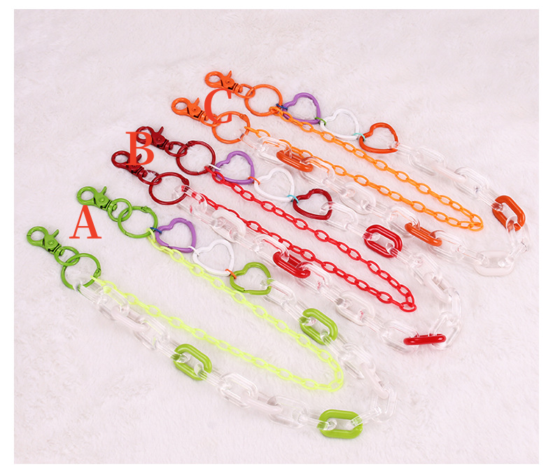 Color block plastic hat chains with heart beads – green, red, and orange variants
