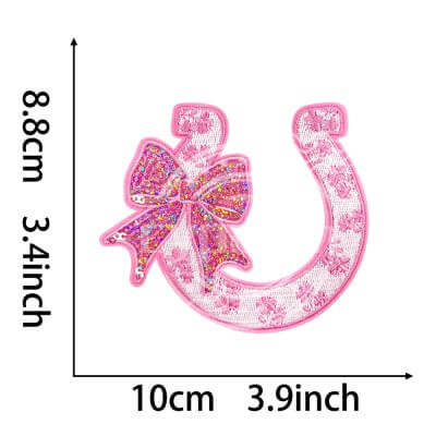 Pink embroidered horseshoe patch with glitter sequin bow and shamrock floral accents