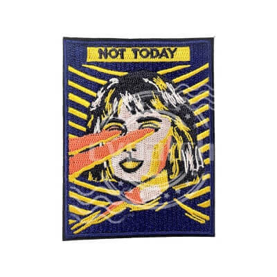 Comic style embroidered patch with woman shooting laser eyes and text 'NOT TODAY'
