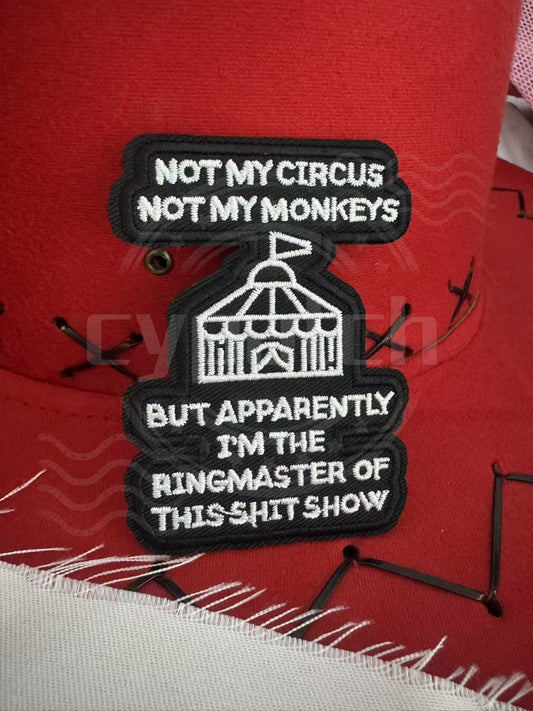 Funny embroidered patch with quote 'Not My Circus, Not My Monkeys' in black and white
