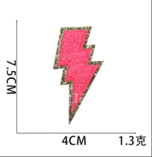 Hot pink lightning bolt embroidered patch with gold glitter border

